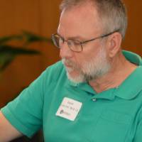 An alumnus enjoying his food